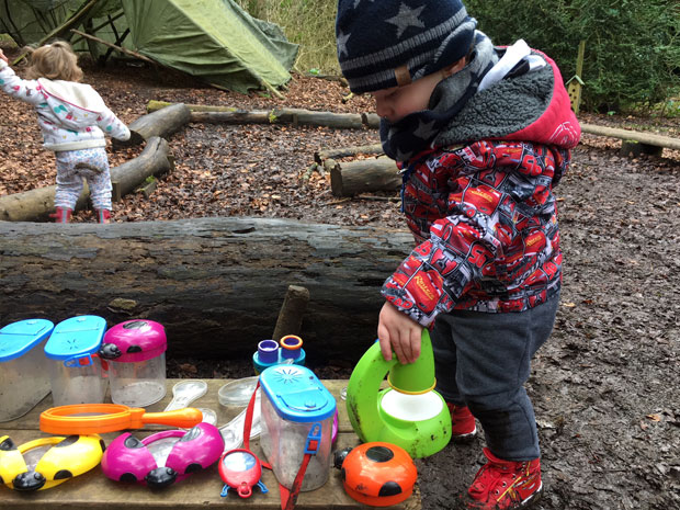 Exploring the equipment at Forest School at Rendcomb College