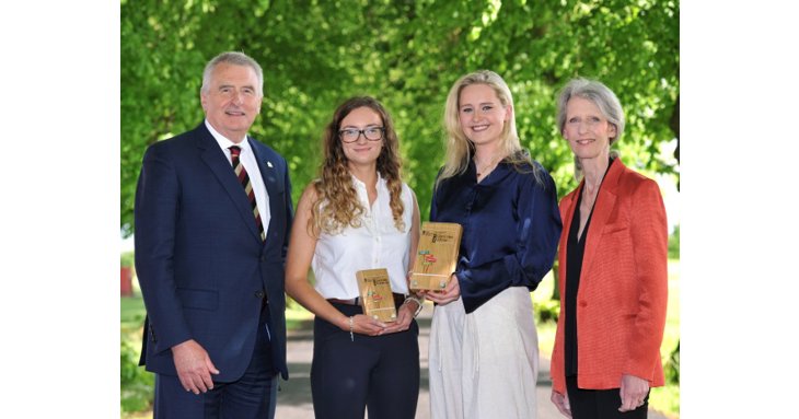 Winners of the RAU Grand Idea award, Camilla Cummins and Imogen Burgoyne, with judges Peter McCaffery and Christine Cross.
