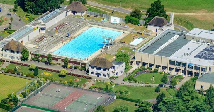 Aerial shot of Stratford Park Leisure Centre and lido in Stroud, Gloucestershire, UK.