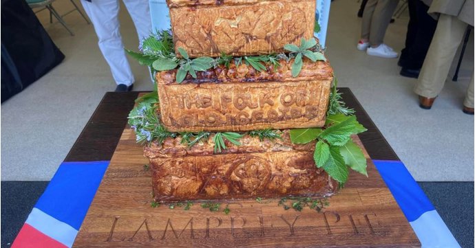 Gloucestershire young people present a coronation pie to King Charles III