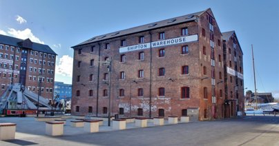 This two-bedroom apartment is in the Grade II listed Biddle and Shipton Warehouse in the heart of Gloucester Docks.